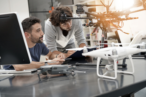 Image of students working on devices